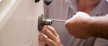 Emergency locksmith arriving at night